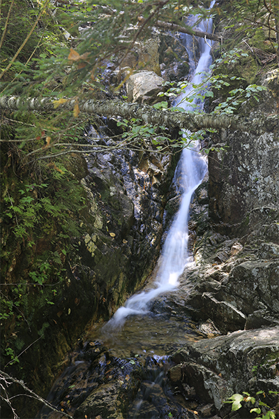 the initial view from the trail of Beecher Cascade, New Hampshire
