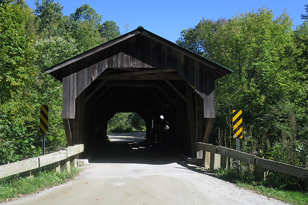 the covered bridge at the parking trailhead of Brewster River Gorge, Vermont
