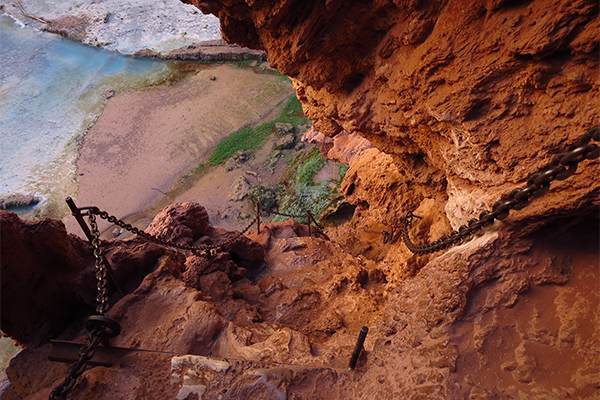 Scrambling down to Mooney Falls